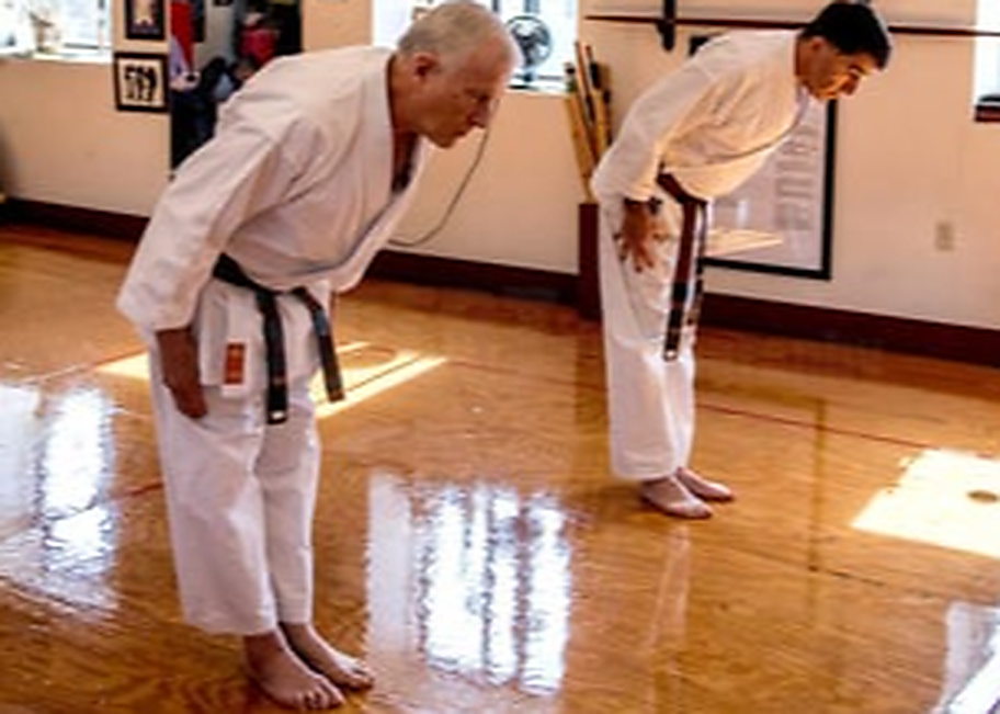 Instructors and students in the dojo