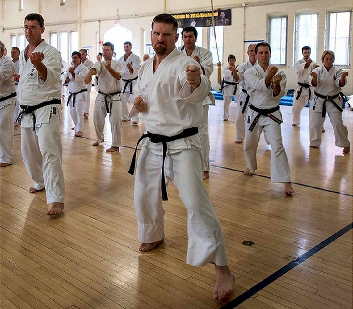 Karate class practicing in dojo