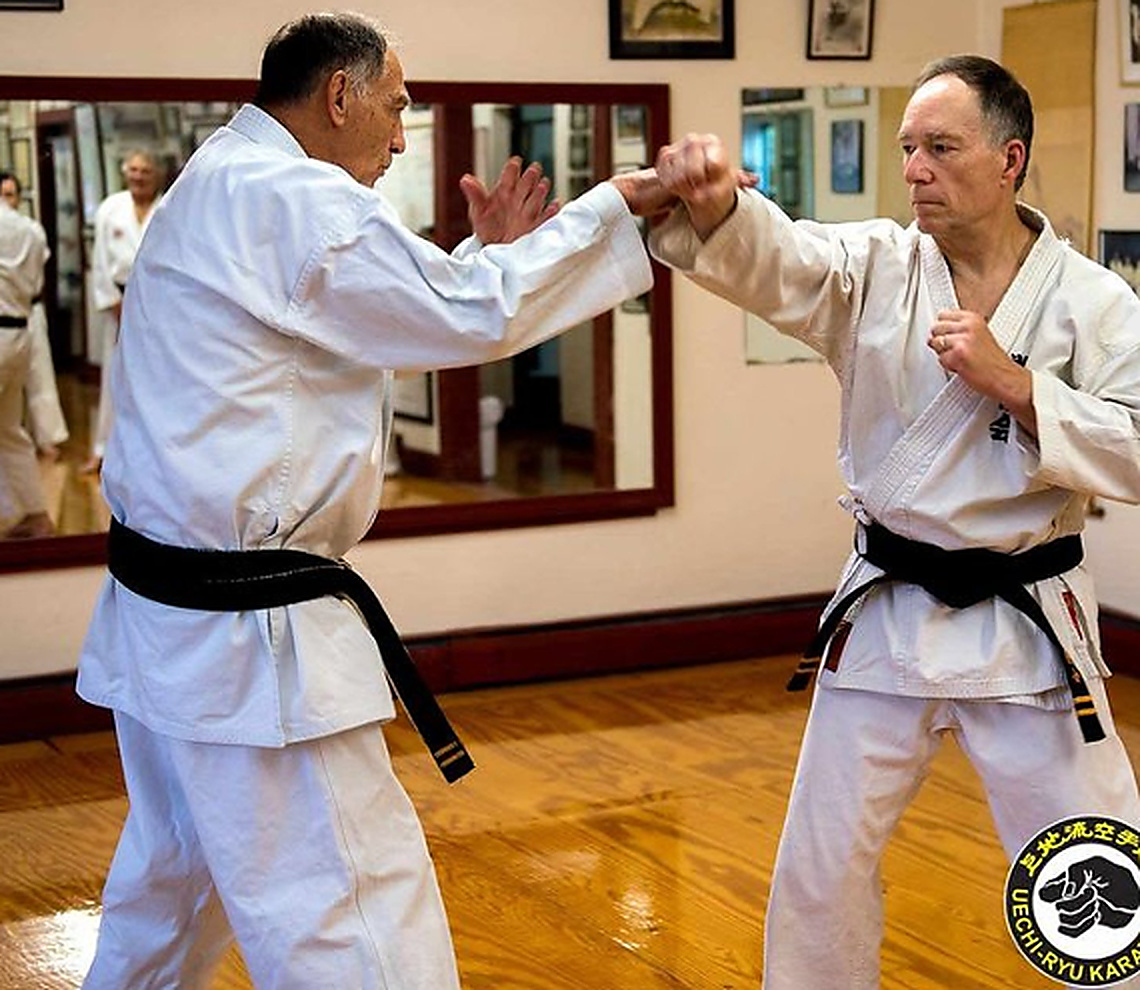 Students practicing karate sparring
